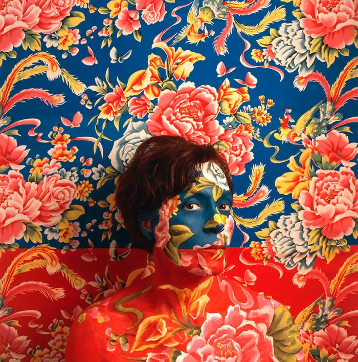 Artist Paints Her Body And Makes It Disappear Into Floral Backgrounds