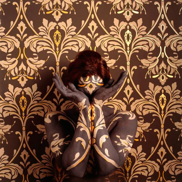 Artist Paints Her Body And Makes It Disappear Into Floral Backgrounds