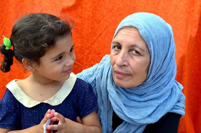 14-Year-Old Girl Takes Stunning Portraits Of Refugees Around The World