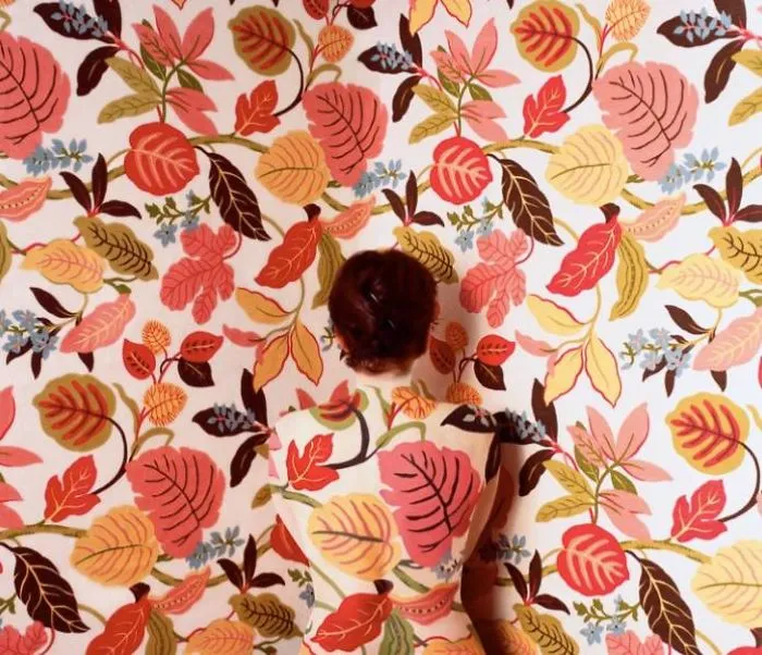 Artist Paints Her Body And Makes It Disappear Into Floral Backgrounds