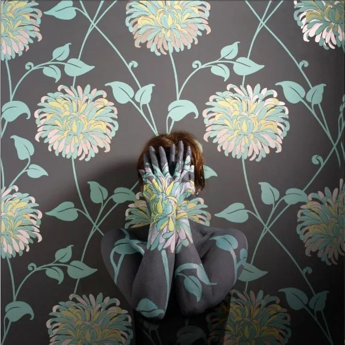 Artist Paints Her Body And Makes It Disappear Into Floral Backgrounds