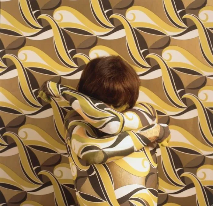 Artist Paints Her Body And Makes It Disappear Into Floral Backgrounds