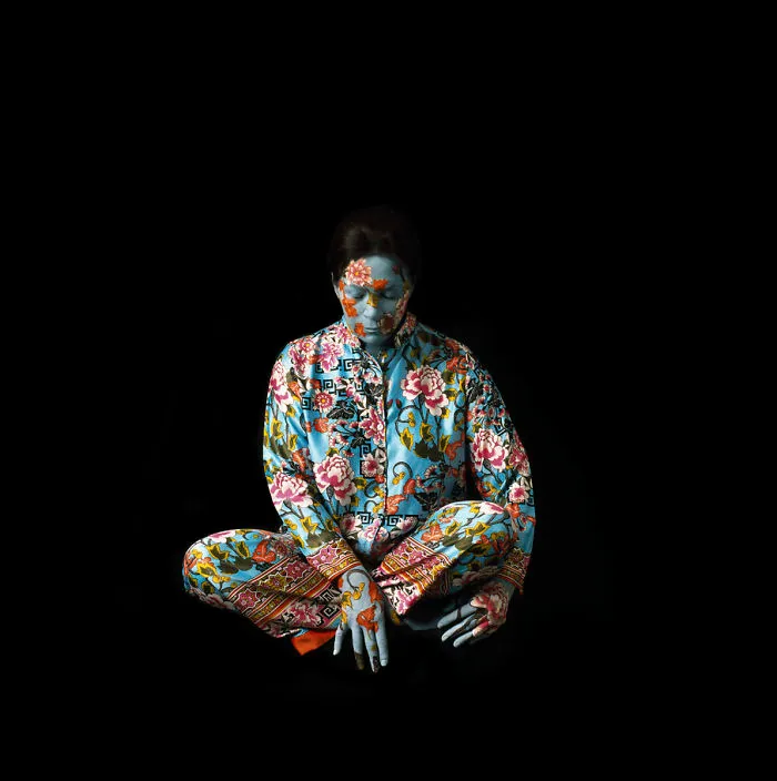 Artist Paints Her Body And Makes It Disappear Into Floral Backgrounds