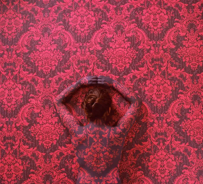 Artist Paints Her Body And Makes It Disappear Into Floral Backgrounds