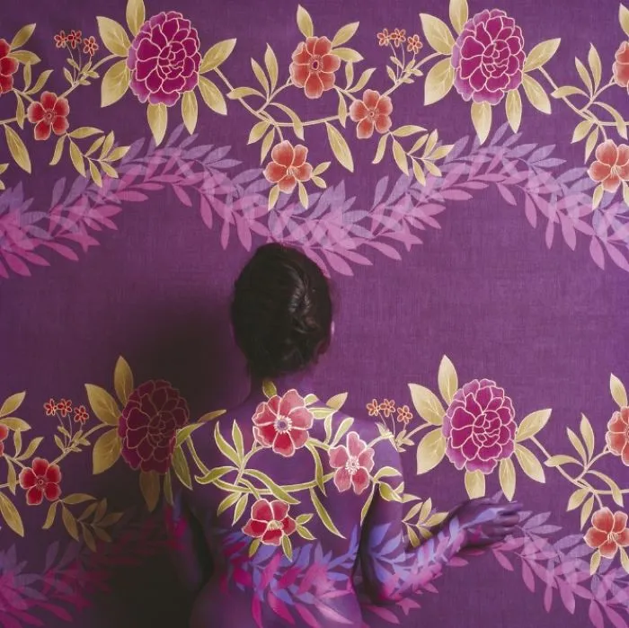 Artist Paints Her Body And Makes It Disappear Into Floral Backgrounds