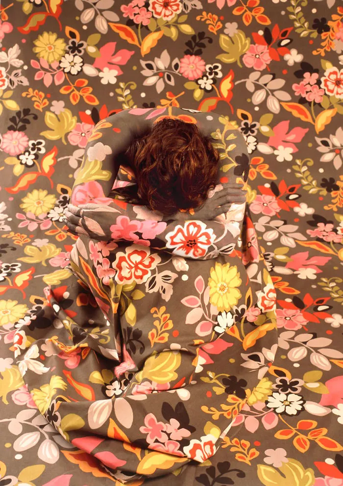 Artist Paints Her Body And Makes It Disappear Into Floral Backgrounds