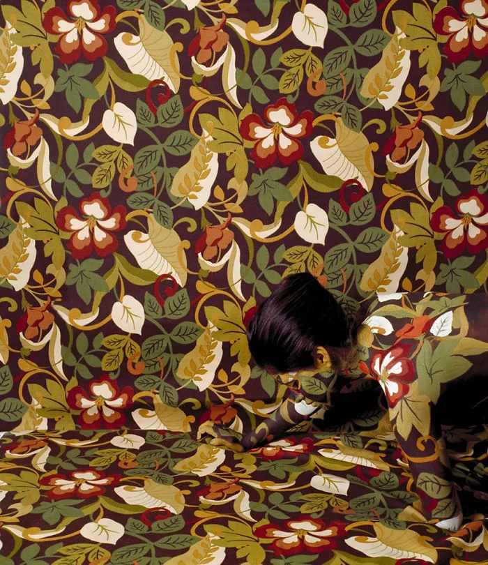 Artist Paints Her Body And Makes It Disappear Into Floral Backgrounds
