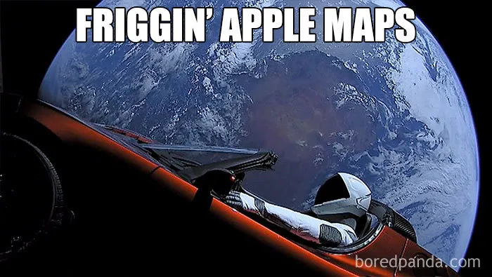 Astronaut in a Tesla floating in space, humorously captioned about Apple Maps, with Earth in the background.