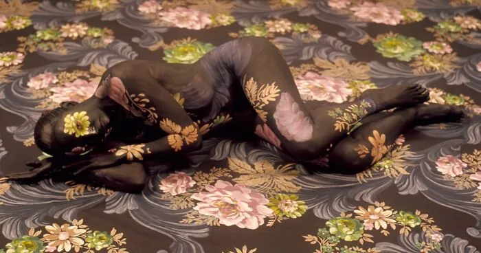 Artist Paints Her Body And Makes It Disappear Into Floral Backgrounds