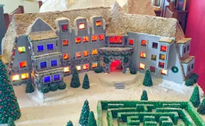 This Family Takes Gingerbread House Building To The Next Level, Destroys Them With An Axe Or Baseball Bat