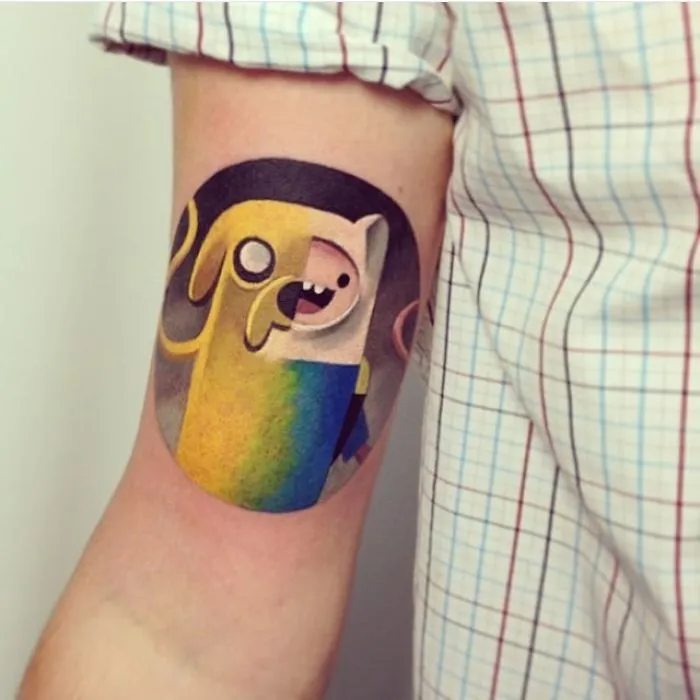 Cartoon character tattoo on arm for ink lover.