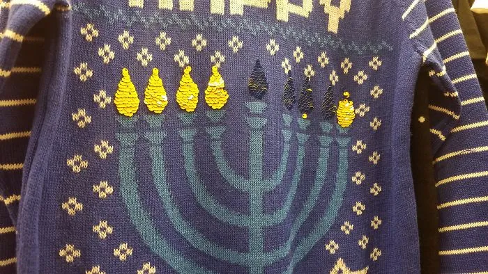 You Can "Light" And "Extinguish" The Flames On The Menorah