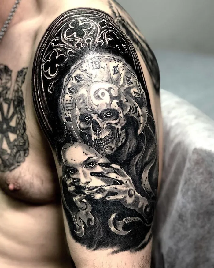 Arm tattoo featuring a detailed skull and face design, perfect for ink lovers seeking creative tattoo ideas.