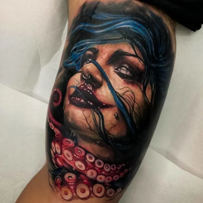 Tattoo of a woman's face intertwined with octopus tentacles, showcasing creative ink ideas for enthusiasts.