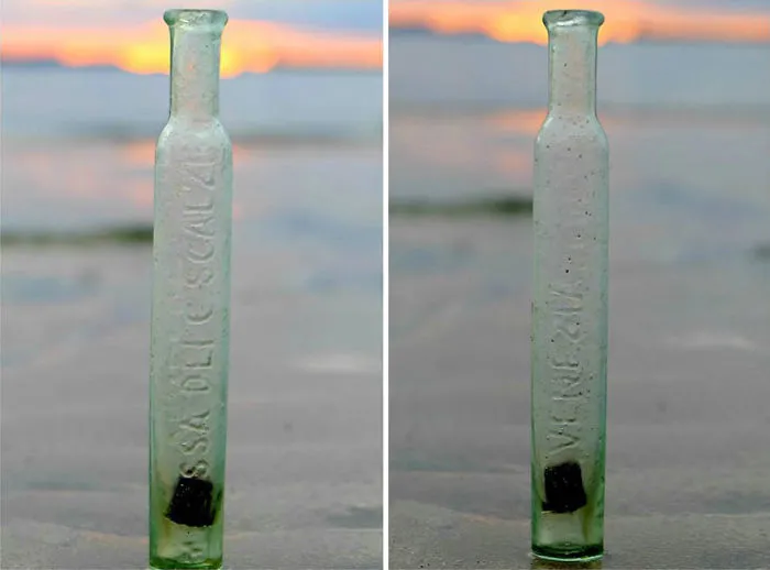 The Bottle With Healing Water Made From The Melissa Herb