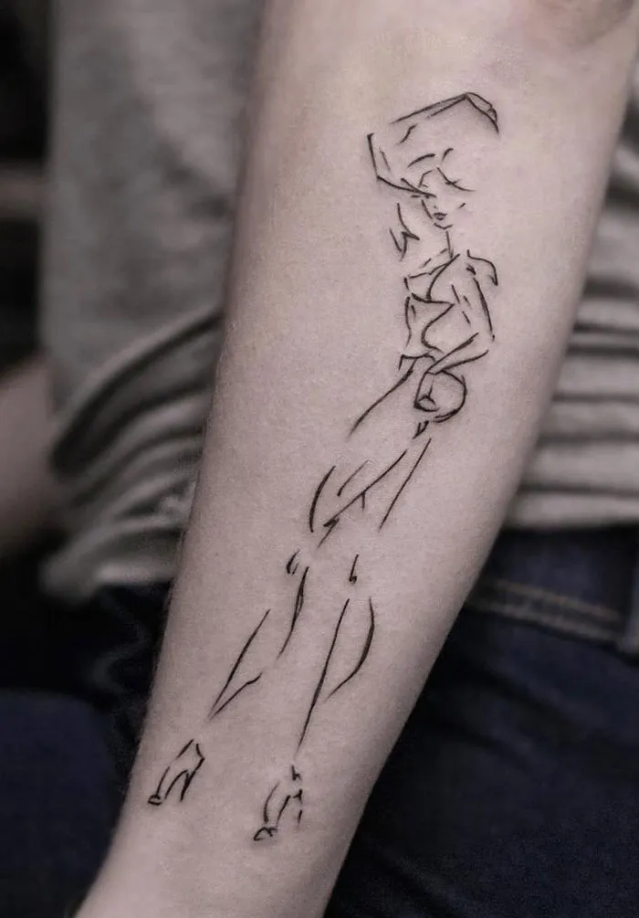 Minimalist line art tattoo design on a forearm, showcasing elegant and artistic ink ideas.