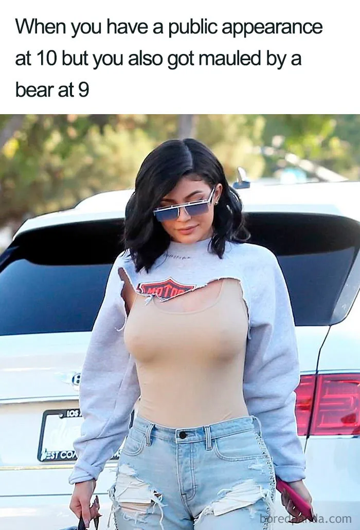 Fashion disaster with a torn shirt and ripped jeans, turned into a hilarious meme moment.