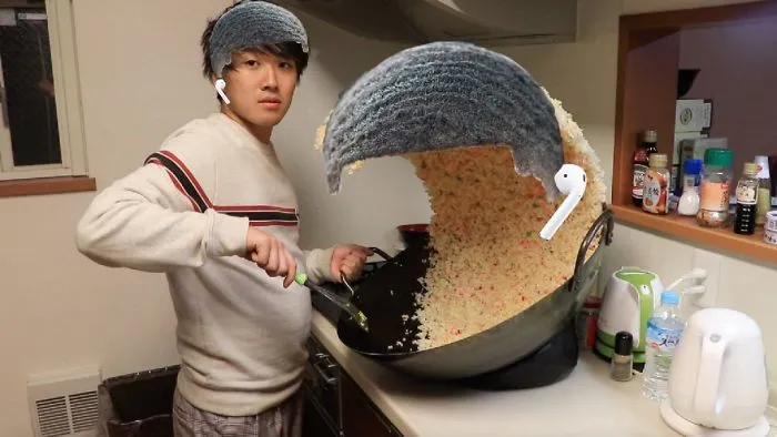 Someone Posts A Photo With A Guy Next To A Giant Rice Wave, People Immediately Start To Photoshop It
