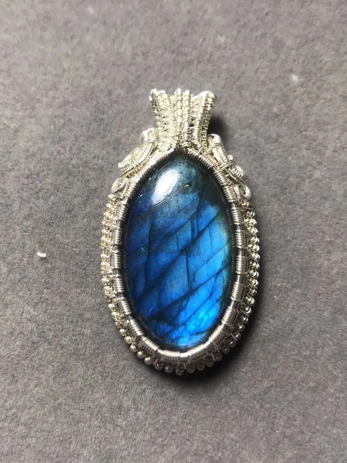 Silver Wire Twisted Into Trees To Beautifully Frame Dazzling Stone Pendants