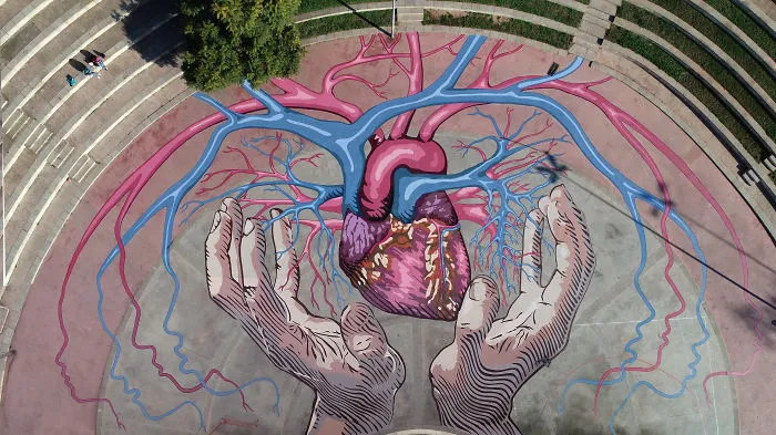 Artist Jorge Rodríguez-Gerada Creates A Monumental Heart At The Parc Dels Pins, In Santa Coloma De Gramenet (Barcelona,) And The City’s Multiculturalism Beats Through Its Veins.