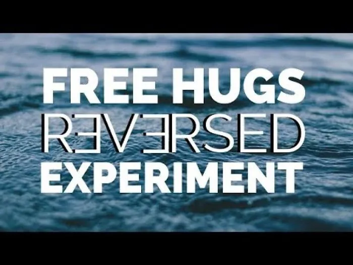 I Hold This "I Need A Hug" Sign For An Hour On The Street And This Is What Happened