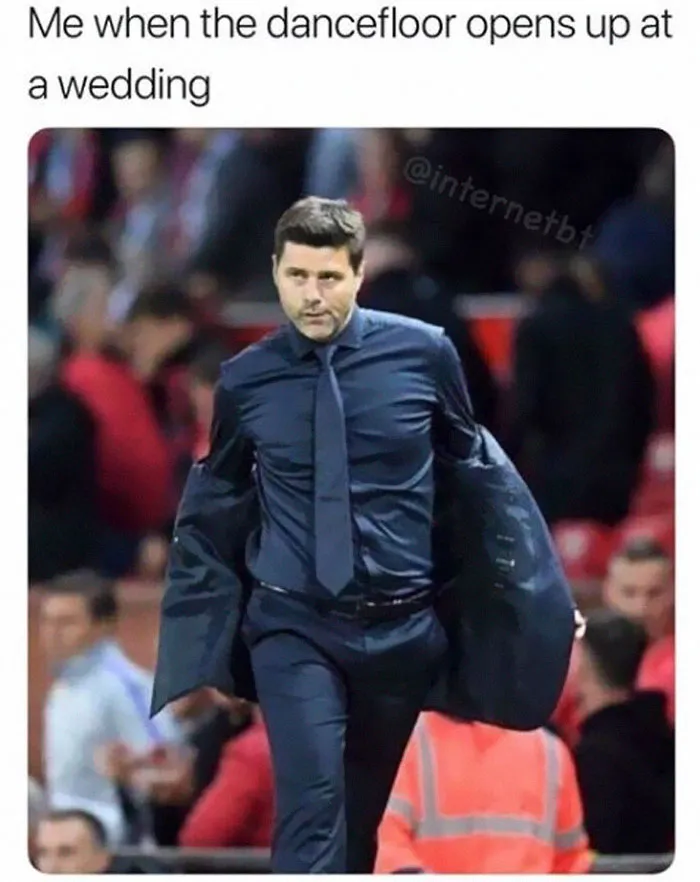 Man in a suit confidently walking, captioned about wedding dancefloor opening, capturing humorous wedding meme vibe.