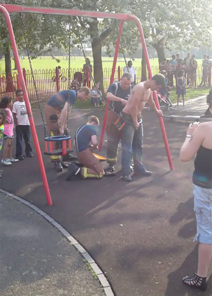 Man Stuck In A Child Swing
