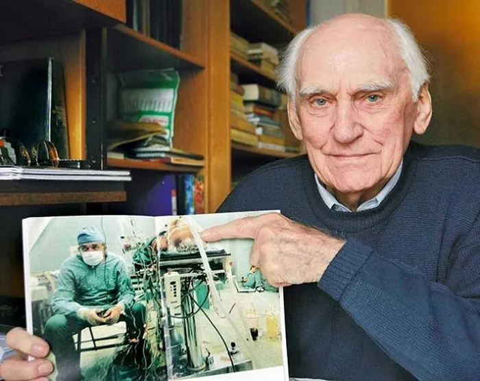 Tadeusz Zytkiewicz Holding A Picture Of Himself