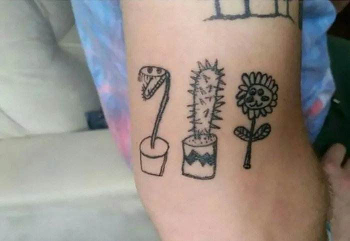 Unique tattoo design with simple line drawing of plants on skin, chosen for its artistic style.