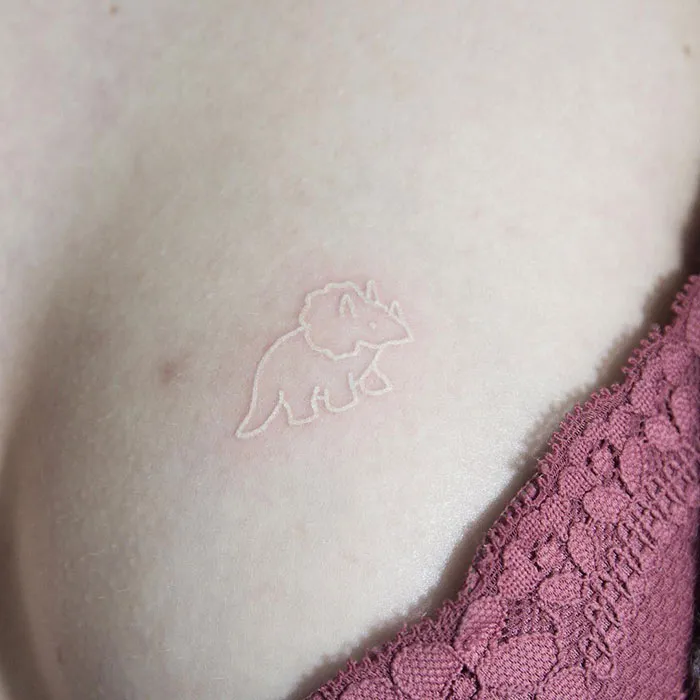30 White Tattoo Designs That Look Like Magic Runes