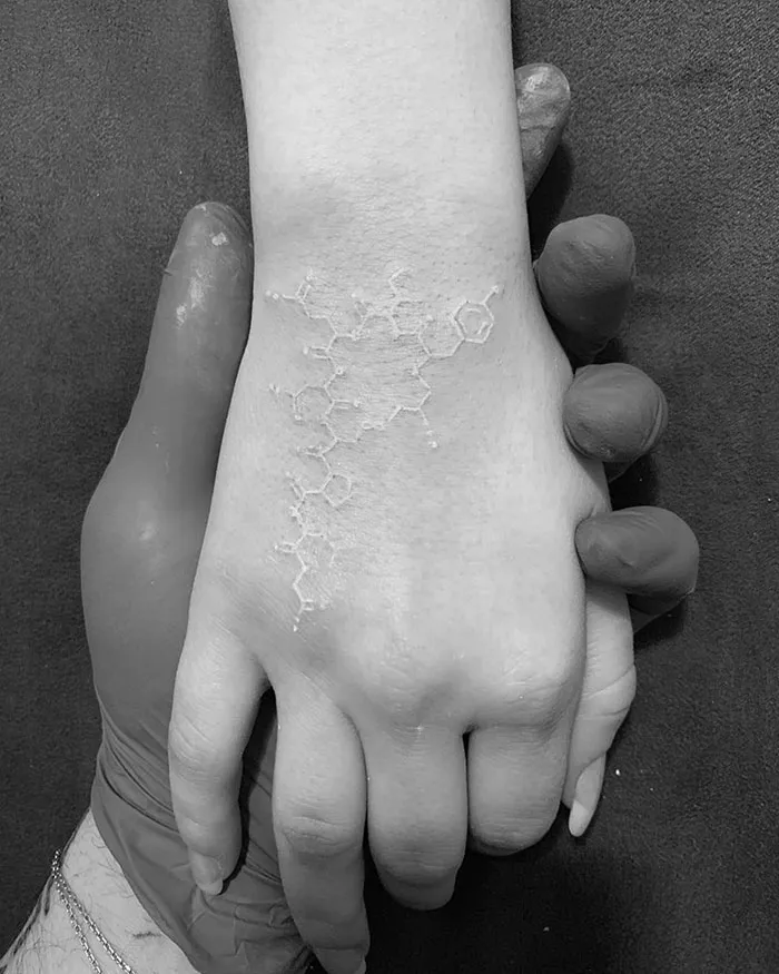 30 White Tattoo Designs That Look Like Magic Runes