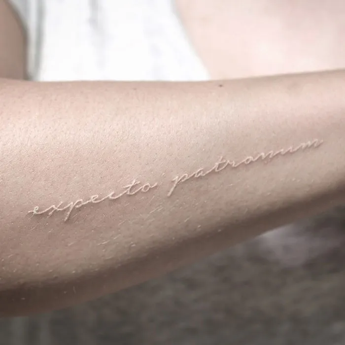 30 White Tattoo Designs That Look Like Magic Runes
