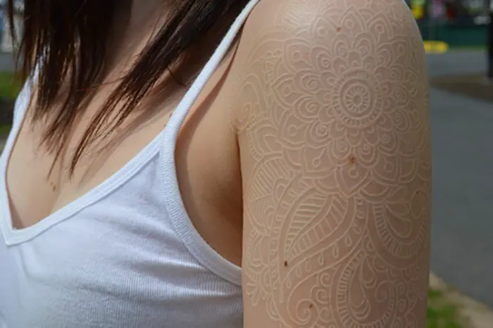 30 White Tattoo Designs That Look Like Magic Runes