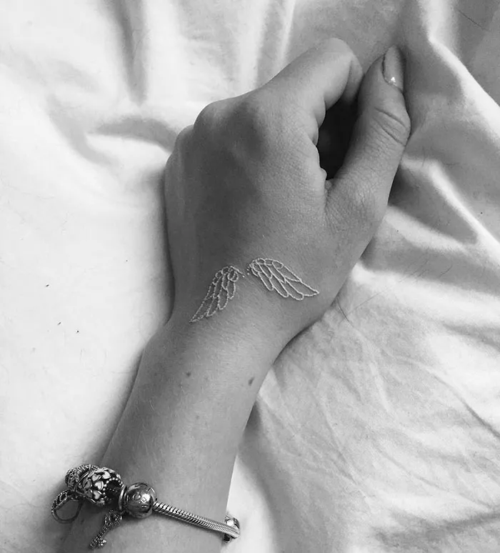 30 White Tattoo Designs That Look Like Magic Runes