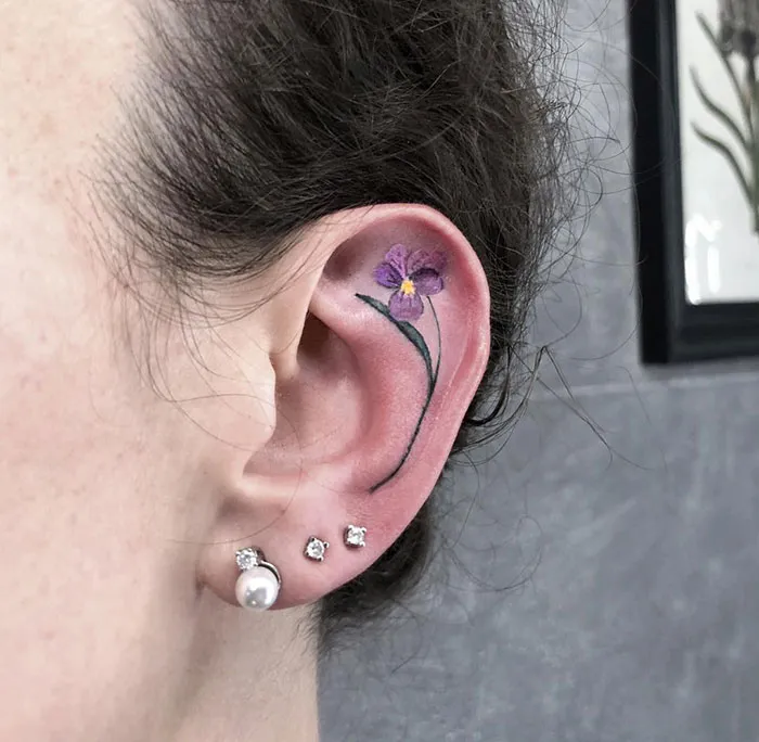 Violetta And Her Violet Ear Tattoo