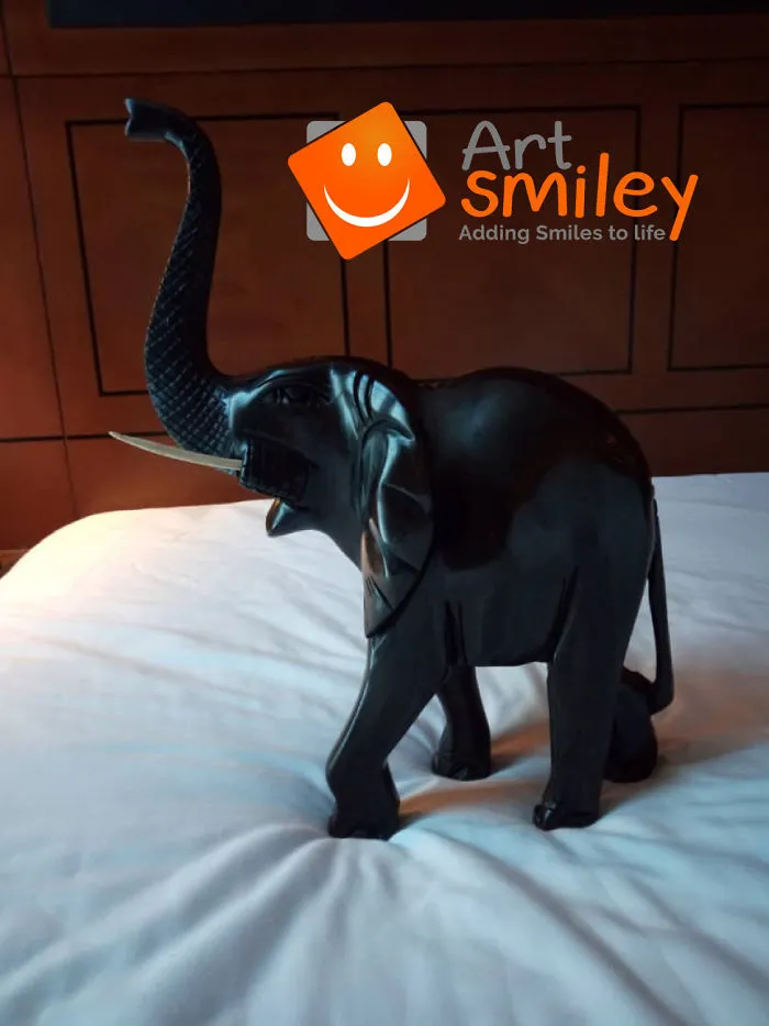 'elephant Stroll' & 'Elephant With Raised Trunk ' - Ebany Wood Sculptures - African Art Sculptures For Sale On Artsmiley.