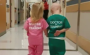 21 Reactions To 'Sexist' Photo Of Girl And Boy Wearing Nurse And Doctor Scrubs
