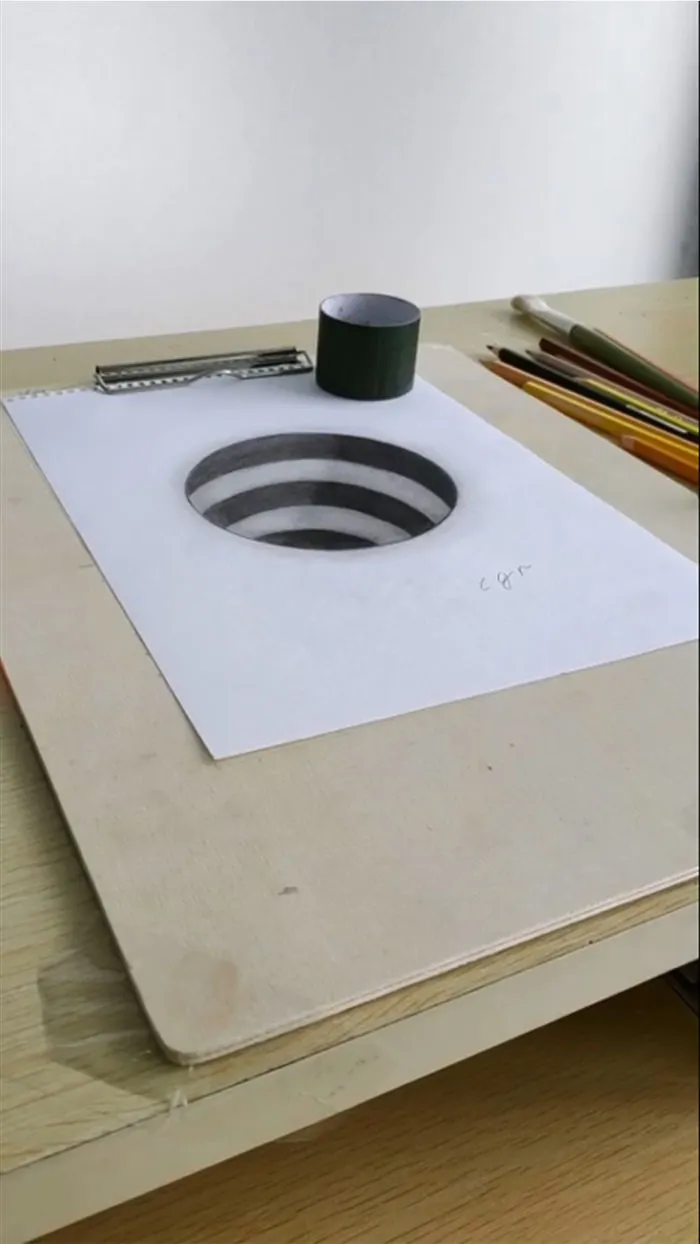Artist Creates 3D Illusions On Simple Sheets Of Paper