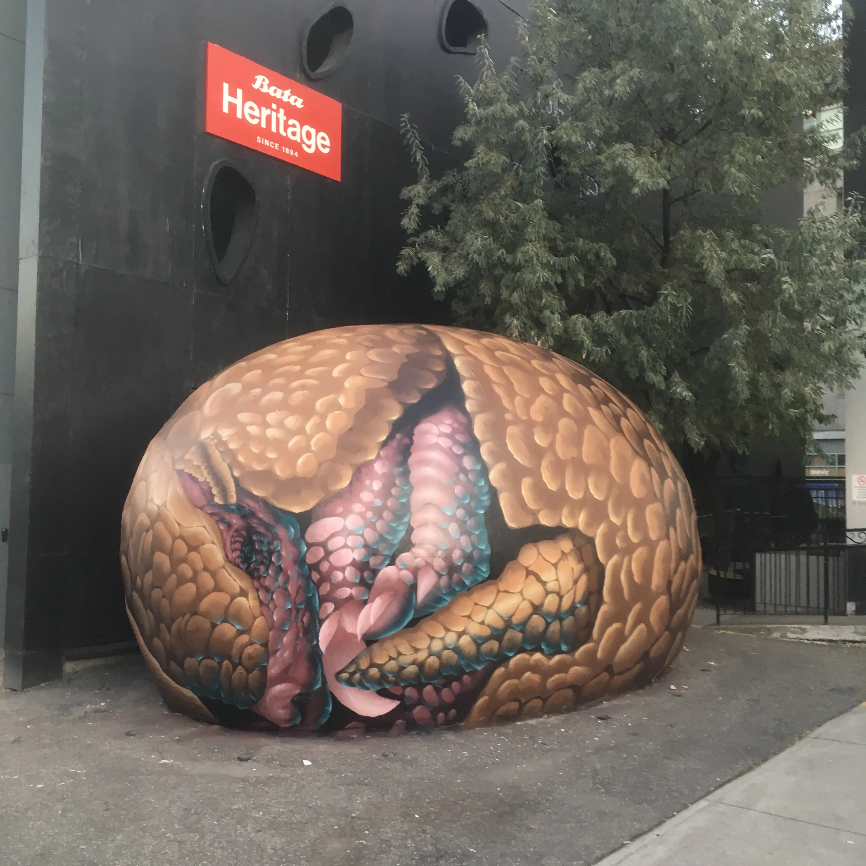 Half Man Half Bird, Paints Surreal Creatures Popping In And Out Of Walls Around The World.