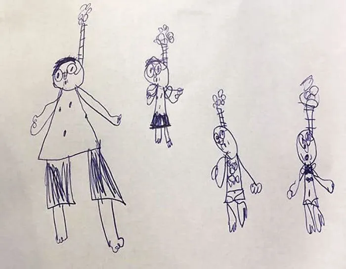 Mi hija nos ha dibujado a toda la familia. Supuestamente estamos buceando