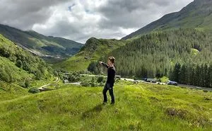 An Archaeologist Exploring Battlefield Of Glenshiel In Scotland