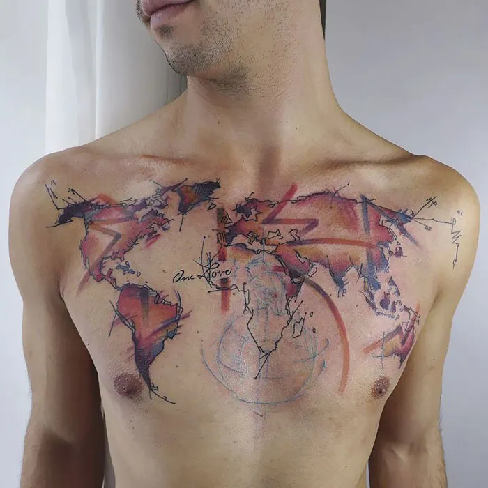Abstract world map chest tattoo design with vibrant colors.