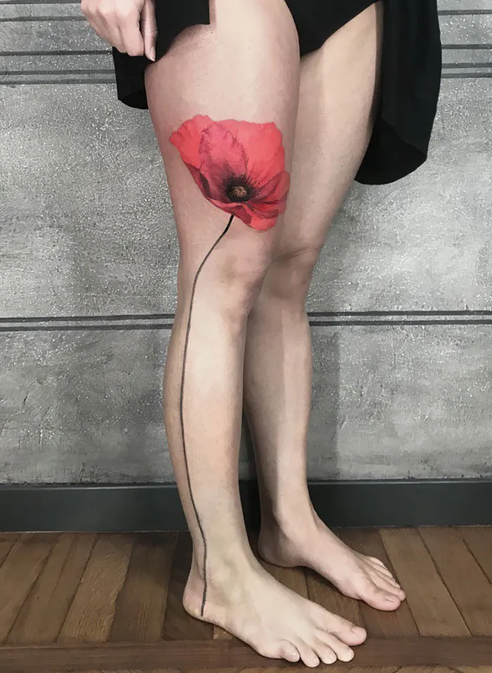 Sweet Poppy in a Half Sleeve Tattoo