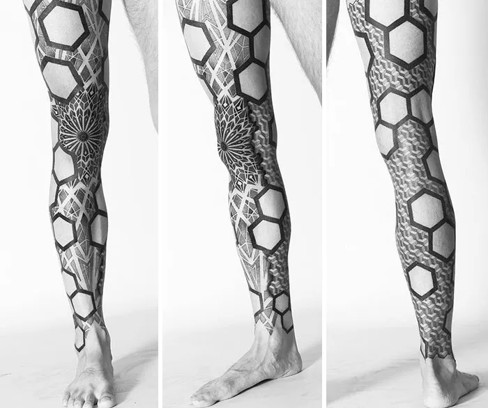 Black and white leg sleeve tattoos featuring geometric patterns and designs.