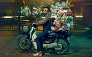 Photographer Captures Moped Delivery Drivers In Hanoi Before They're Banned