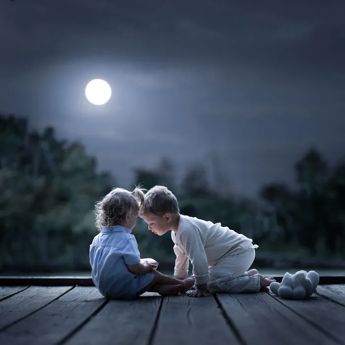 Chicago, Il - Children Of A Polish Couple Living In Chicago At A Deck By A Pond