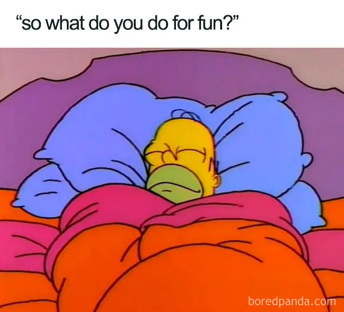 Cartoon character sleeping in bed with colorful blankets, illustrating a funny sleeping meme.