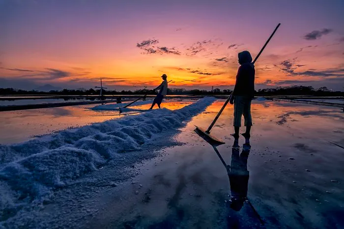 Salt Farmer During Sunset