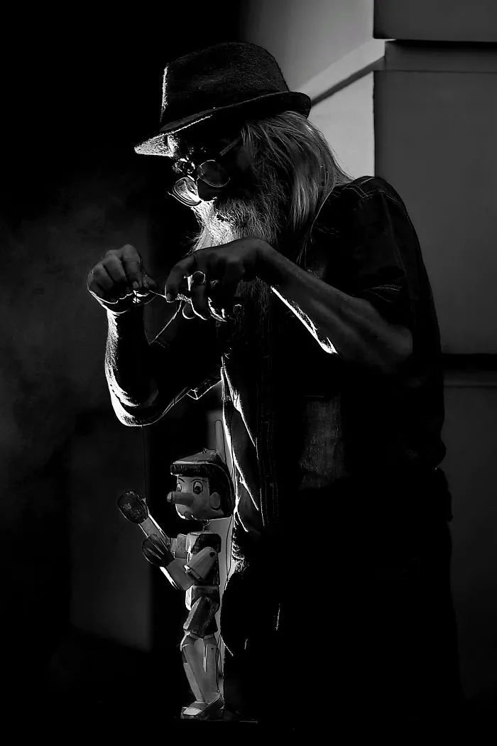 Old Man And Pinocchio Puppet