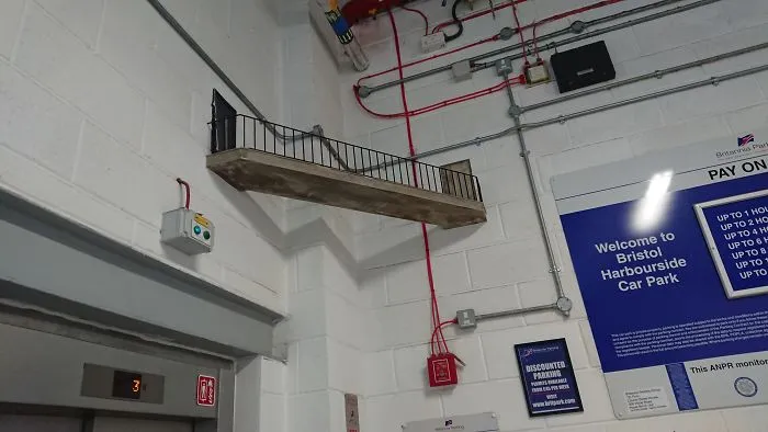 In A Multi Storey Car Park. Is It A Passage For Rats? There Are Also Small Holes In The Floor And Ceiling With A Tiny Ladder Connecting Them